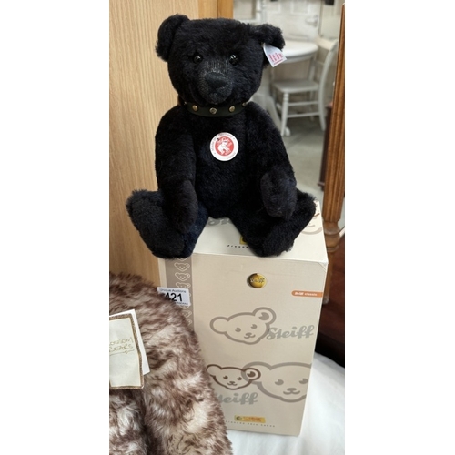 421 - A boxed Steiff classic black bear with growler & A Blossom bear