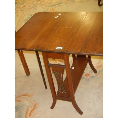 1562 - An Edwardian mahogany Sutherland table, COLLECT ONLY.