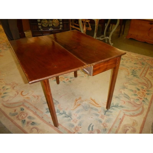 1563 - A Victorian mahogany fold over games table, COLLECT ONLY.