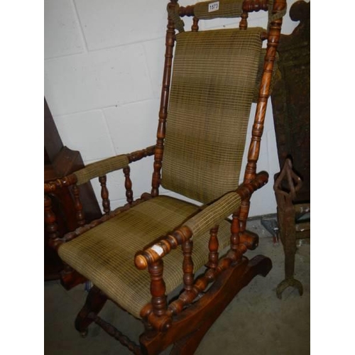 1573 - An early 20th century American rocking chair, COLLECT ONLY.