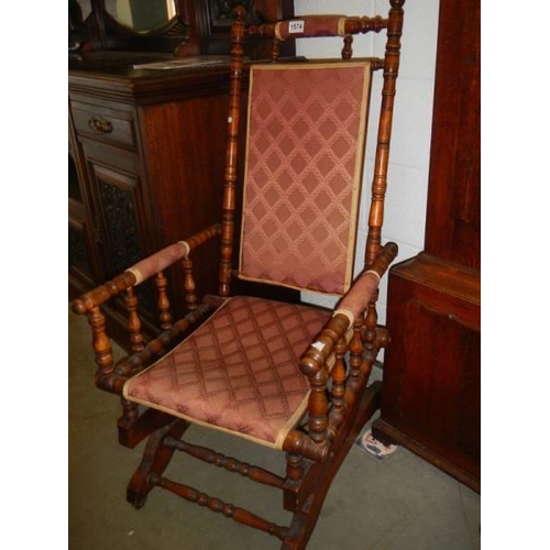 1574 - An early 20th century American rocking chair, COLLECT ONLY.