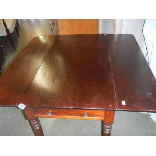 1584 - A mahogany Pembroke table. COLLECT ONLY.