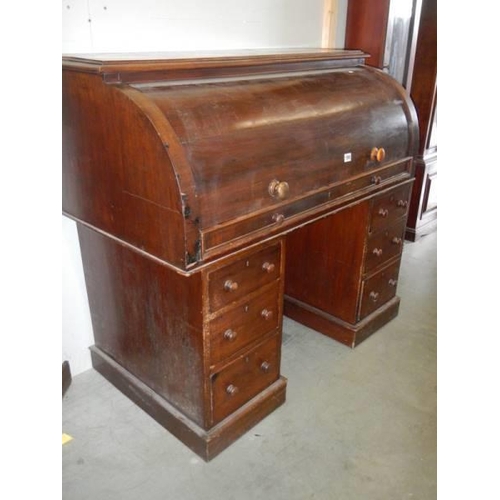 1590 - A barrel top double pedestal clerks desk, COLLECT ONLY.