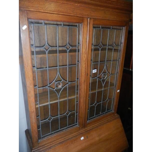 1606 - A lead glazed bureau bookcase. COLLECT ONLY.