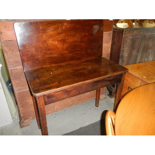 1611 - A mahogany fold over tea/games table. COLLECT ONLY.