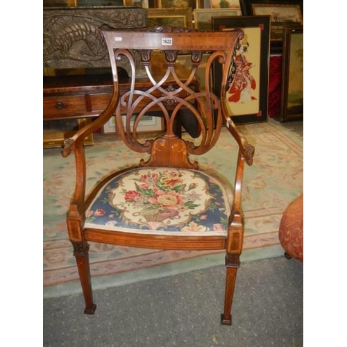 1622 - A good quality Victorian mahogany carved and inlaid elbow chair. COLLECT ONLY.