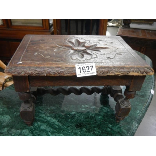 1627 - An old 20th century carved foot stool.