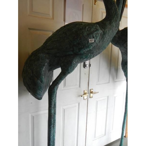 1631 - A tall pair of 20th century bronze storks, 248 cm tall. COLLECT ONLY.