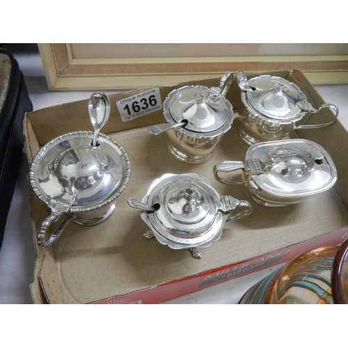 1636 - A quantity of silver plate salt and mustard pots.