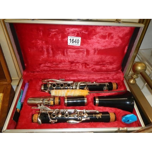 1640 - A Boosey and Hawkes cased bakelite clarinet.