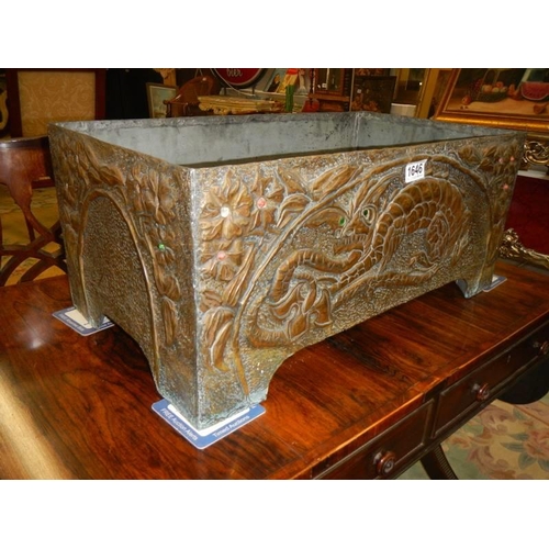 1646 - A large 19th century Chinese zinc lined brass planter with relief dragon decorations, 64 x 36 x 27 c... 