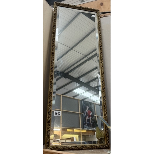 1602 - A gilt frame bevel edge mirror 35 x 95cm