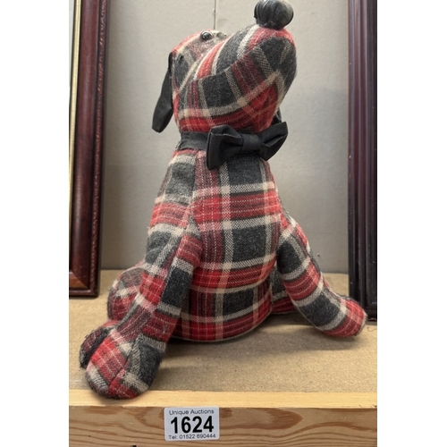 1624 - A tartan covered soft dog door stop