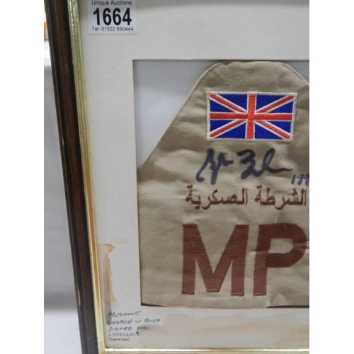 1664 - A British MP armband signed by George W Bush, 1991. COLLECT ONLY