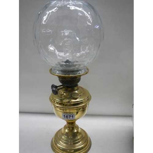 1671 - An old brass oil lamp with shade, COLLECT ONLY.