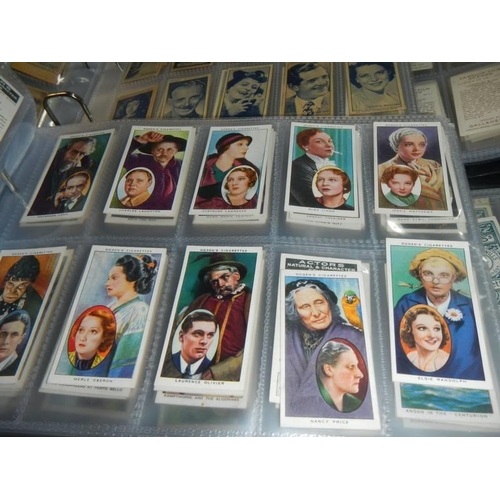 1680 - Nine albums of part sets of cigarette cards.