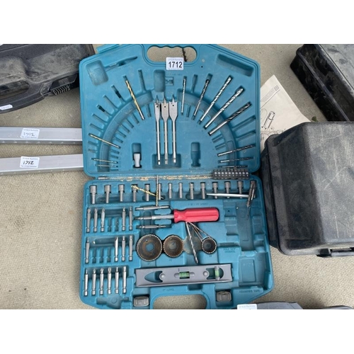 1712 - A quantity of drill bits ,A Bosch router etc