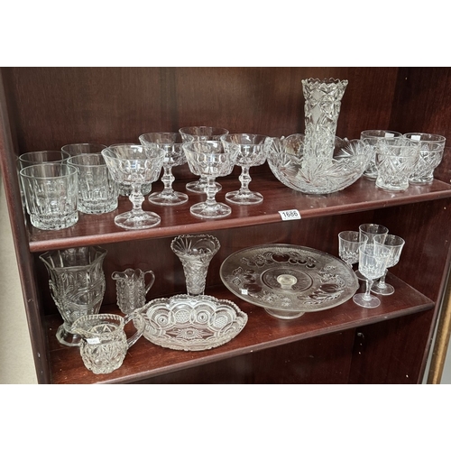 1686 - Two shelves of glass