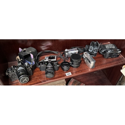 1687 - A quantity of Zenit & Pentax cameras etc