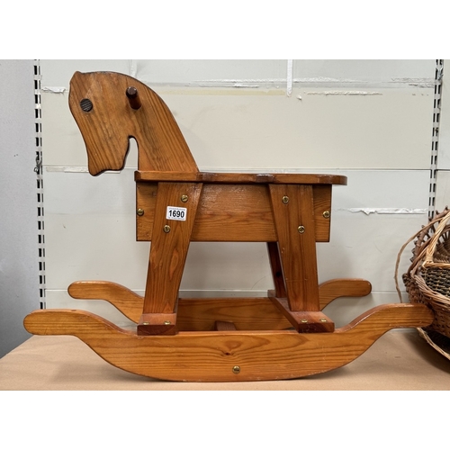 1690 - A pine toddlers rocking horse