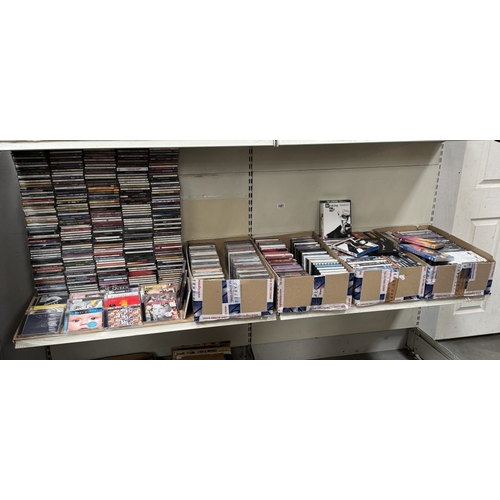 1691 - Approximately 400 CDs, Two boxes of DVDs including 1 Blue ray & Ultimate Bourne Collection steel