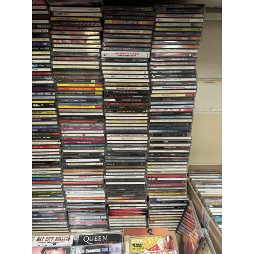 1691 - Approximately 400 CDs, Two boxes of DVDs including 1 Blue ray & Ultimate Bourne Collection steel