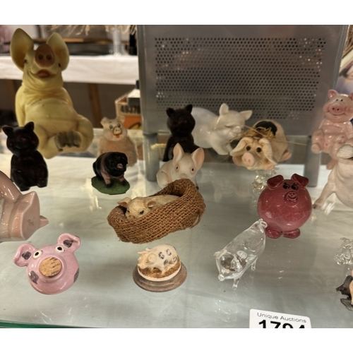 1794 - A mixed lot of pottery pigs etc