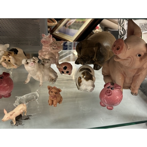 1794 - A mixed lot of pottery pigs etc