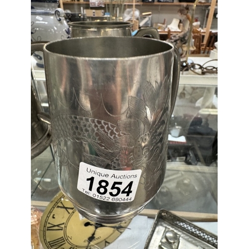 1854 - Three pewter mugs