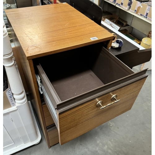 1867 - A teak effect three drawer filing cabinet