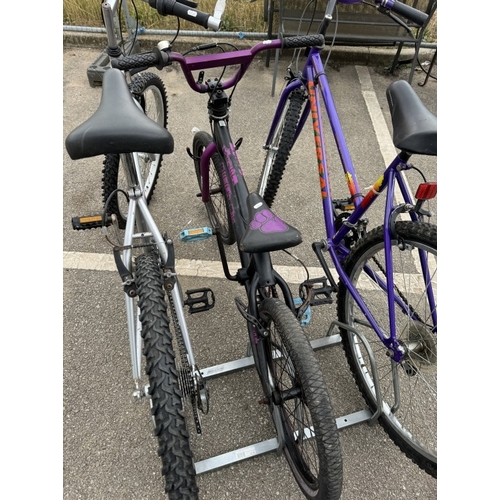 1873 - Three bicycles with a large quantity of spare wheels, tyres & a box of tools