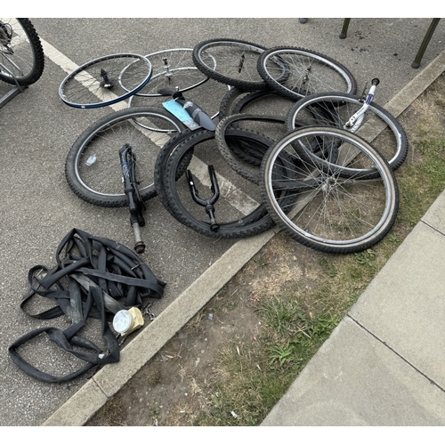 1873 - Three bicycles with a large quantity of spare wheels, tyres & a box of tools