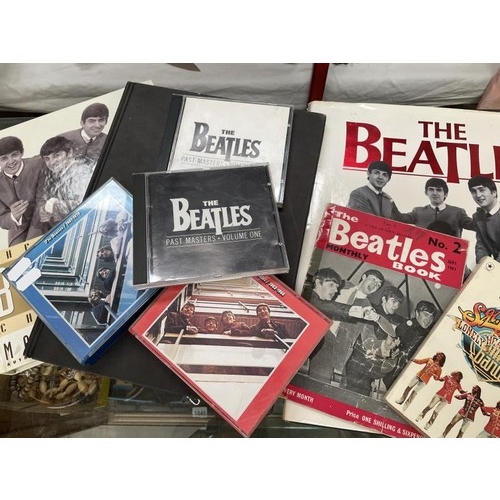 1673 - A quantity of Beatles books etc