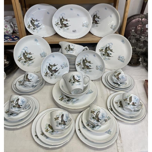 1621 - A dinner & tea service featuring flying duck pattern (approximately 50 pieces)