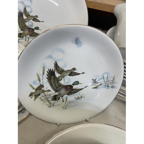 1621 - A dinner & tea service featuring flying duck pattern (approximately 50 pieces)