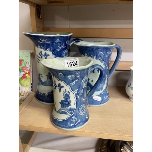 1624 - 3 graduated Chinese blue & white jugs