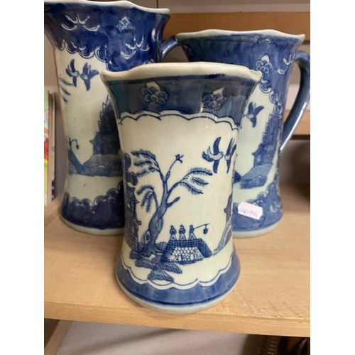 1624 - 3 graduated Chinese blue & white jugs