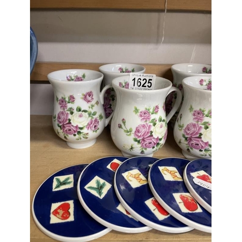 1625 - A set of 6 pink & white rose pattern coffee cups & 6 coasters