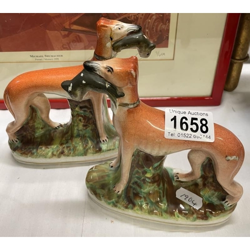 1658 - A pair of Staffordshire Greyhounds with rabbits