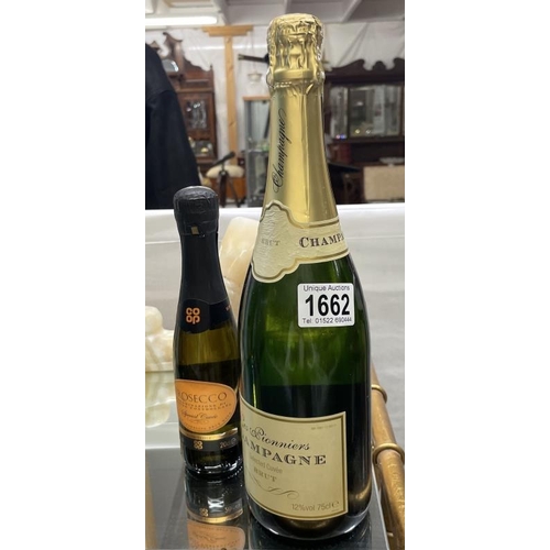 1662 - A bottle of champagne and a small Prosecco.