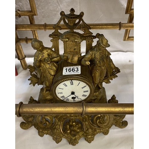 1663 - A gilt figural clock