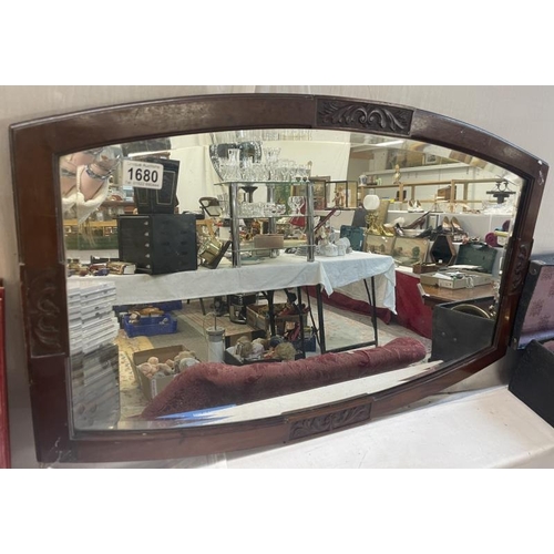 1680 - A decorative mirror approximately 75cm x 47.5cm