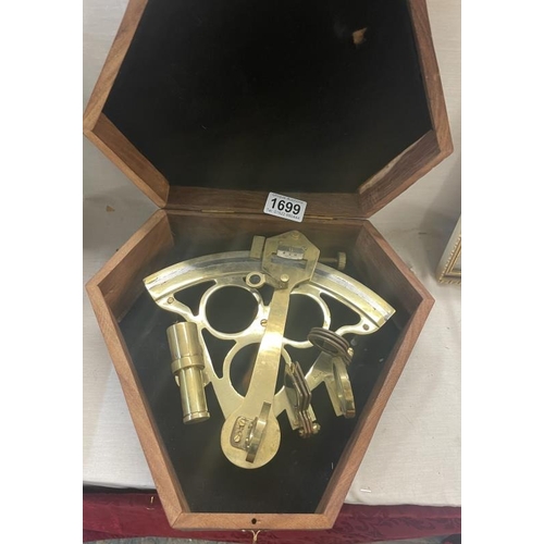 1699 - A brass compass / sundial in hard wood case