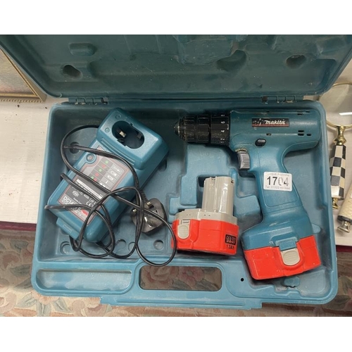 1704 - A Makita drill with battery & charger (untested)