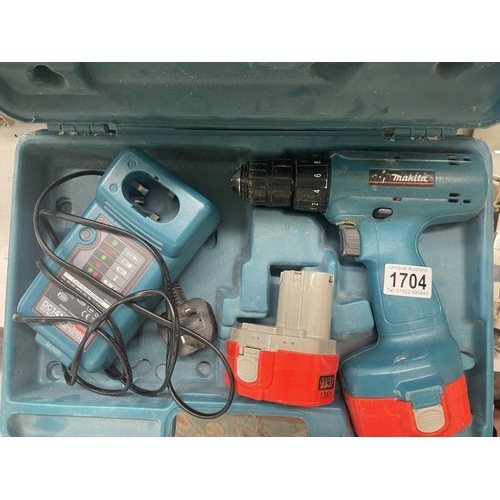 1704 - A Makita drill with battery & charger (untested)