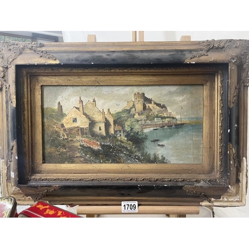 1709 - A framed oil on board depicting a coastal scene with house & Castle, European school