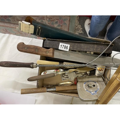 1786 - A mixed lot of items including slide rule, wire carpet better & letter knife/opener etc