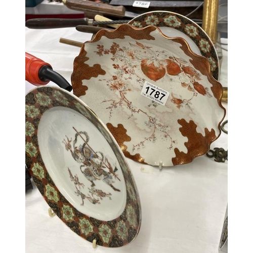 1787 - A pair of Japanese Satsuma plates with hand painted decoration and a Kutani plate.