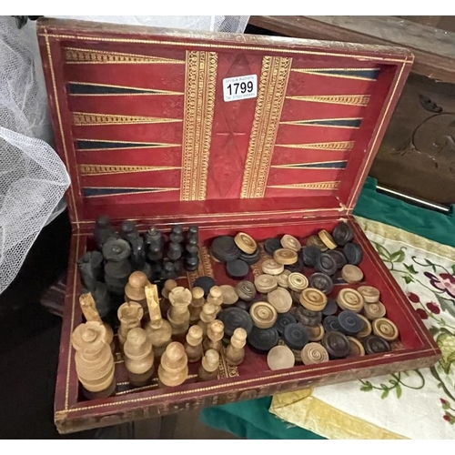 1799 - A decorative box with draughts & chess pieces