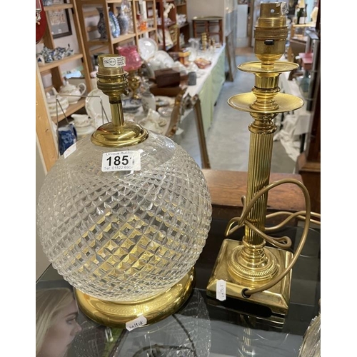 1851 - A glass orb & brass table lamp base & a brass column lamp base